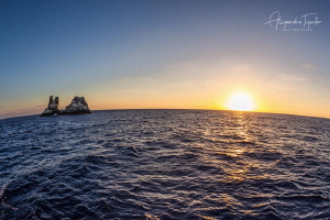 Roca Partida and the sunset, Revillagigedo Islands México by Alejandro Topete 